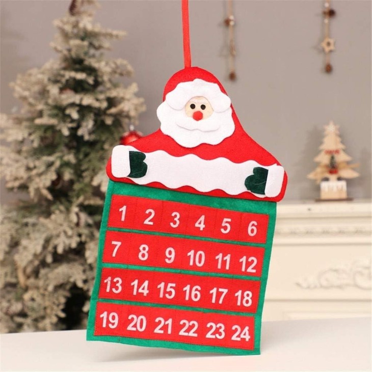 Calendar de Craciun Flippy, Mos Craciun, tip decoratiune, material poliester, cu buzunarele, pentru brad sau prete, 20 x 30 cm, multicolor